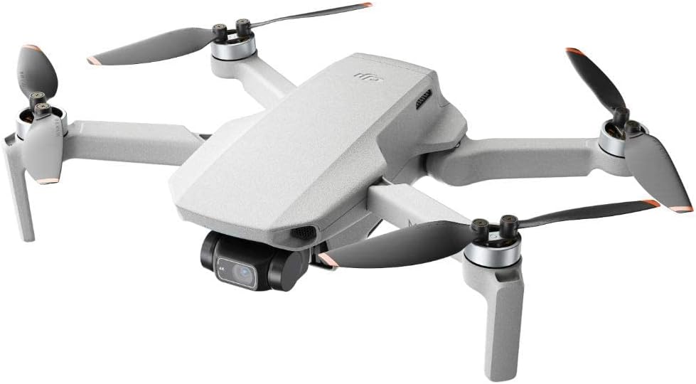 DJI Mini 2 - Ultralight and Foldable Drone Quadcopter, 3-Axis Gimbal with 4K Camera, 12MP Camera, 31 Minutes Flight Time, OcuSync 2.0 HD Video Transmission, Mavic Mini, QuickShots with DJI Fly App